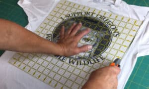 Cutting out T-shirt for quilts