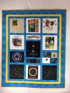 Image of the custom eclipse t-shirt quilt that I made for a customer