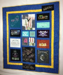 Image of a themed custom t-shirt quilt that I made for a customer